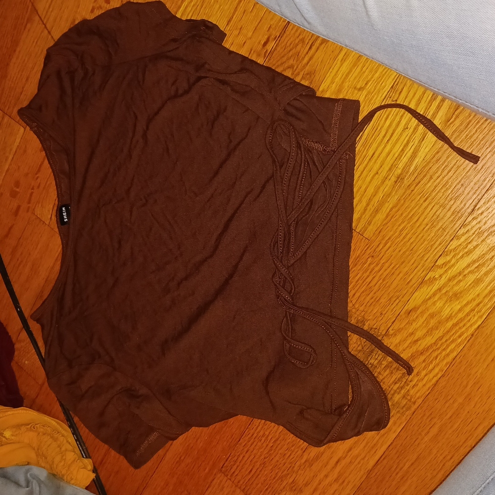 Brown shirt tie back